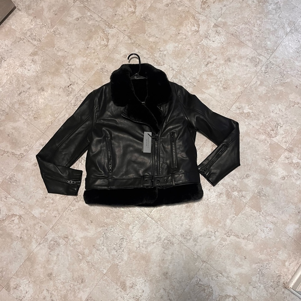 Leather jacket with removable fur